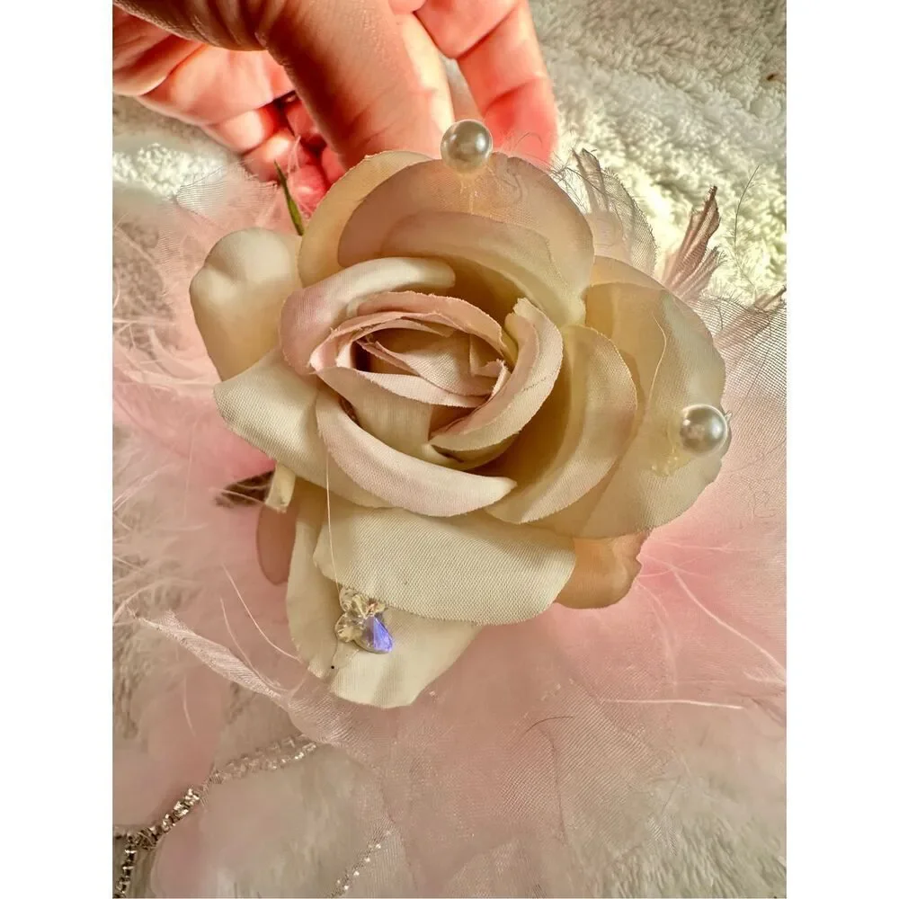 Light pink rose with feather hair claw